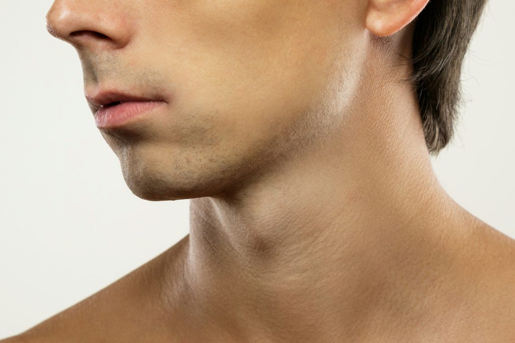 Close up of clean shaven male face